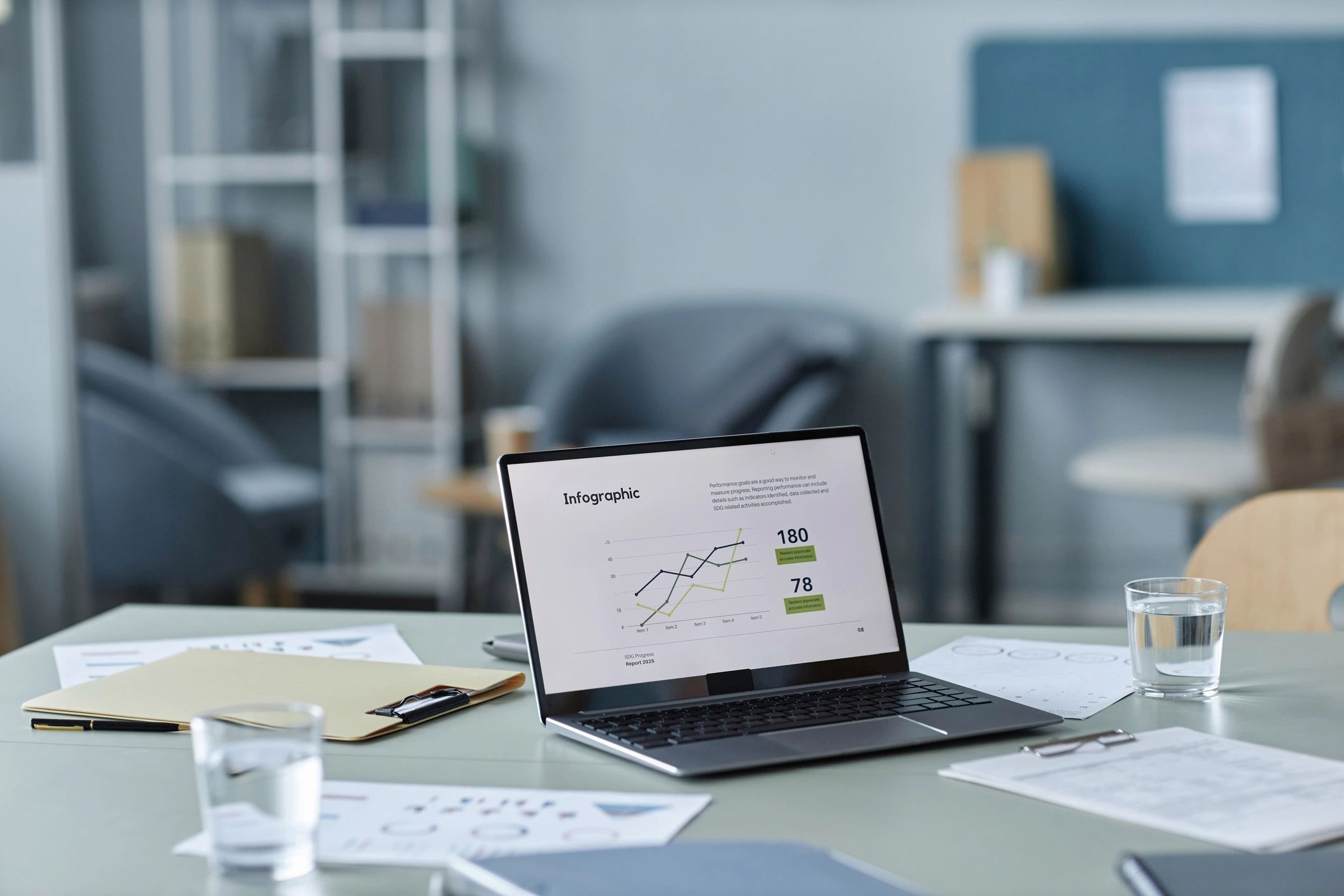 Laptop with analytics dashboard in a modern workspace
